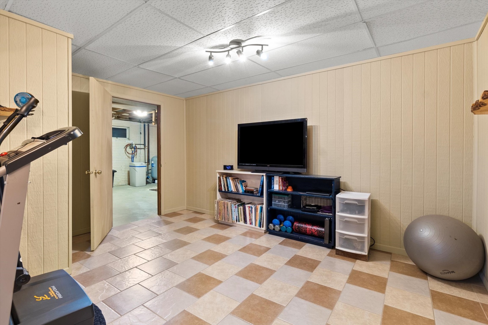 15344 Norrish Road Morrison, IL 61270 - Photo 32 of 50 a view of a livingroom with furniture and a flat screen tv