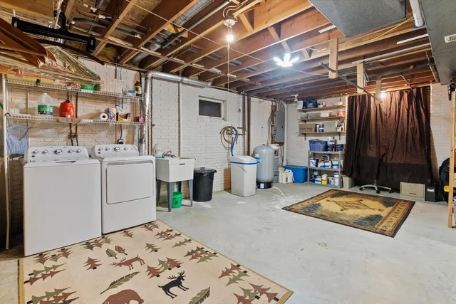 a storage room with washer and dryer