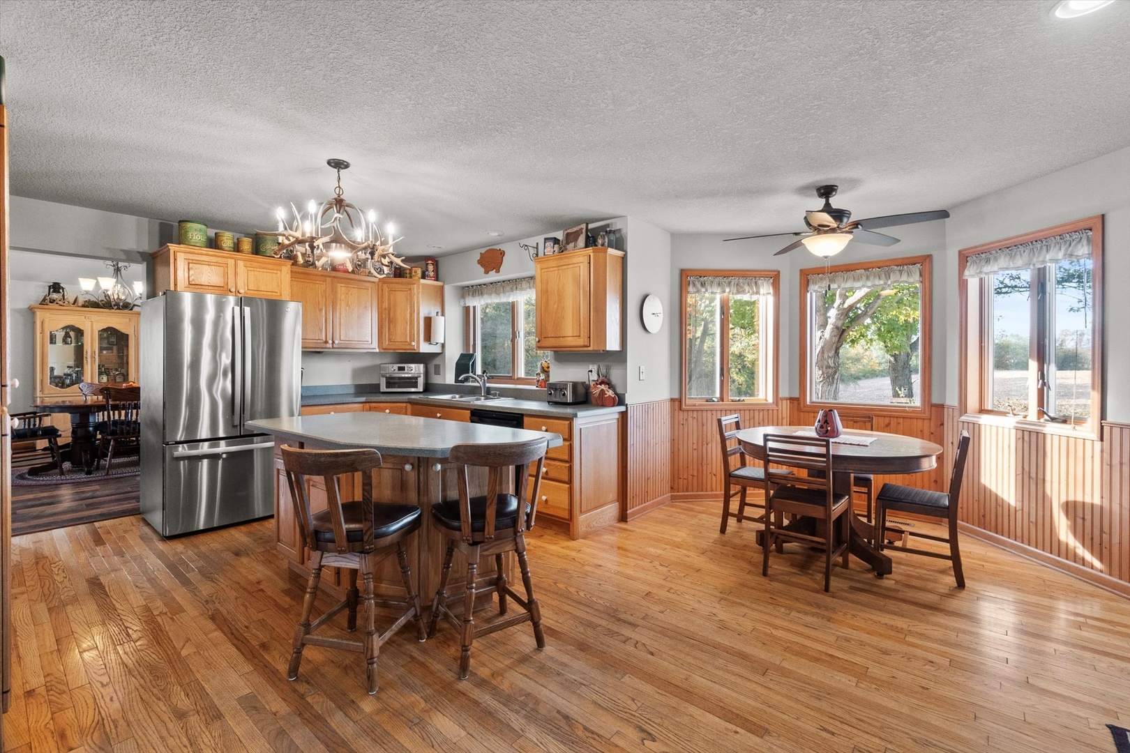 15344 Norrish Road Morrison, IL 61270 - Photo 8 of 54 a view of a dining room with furniture window and wooden floor