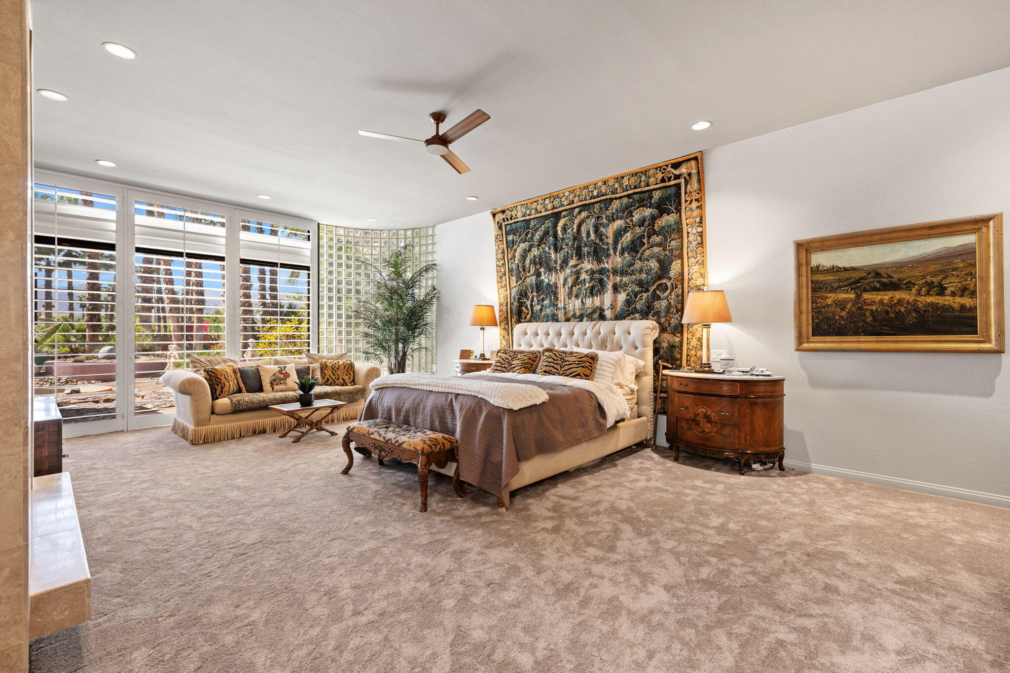 7 Big Sioux Road Rancho Mirage, CA 92270 - Photo 21 of 64 a spacious bedroom with a bed and a couch