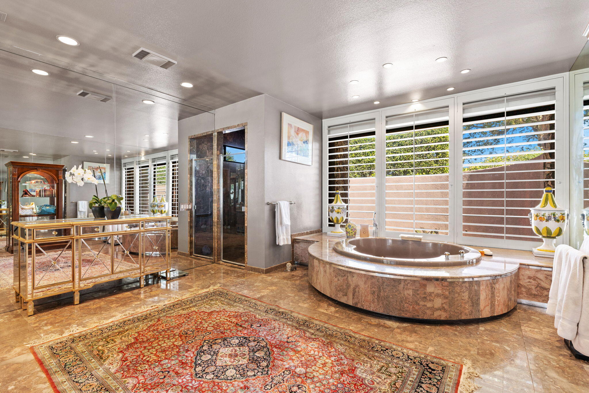 7 Big Sioux Road Rancho Mirage, CA 92270 - Photo 23 of 64 a living room with furniture and a potted plant