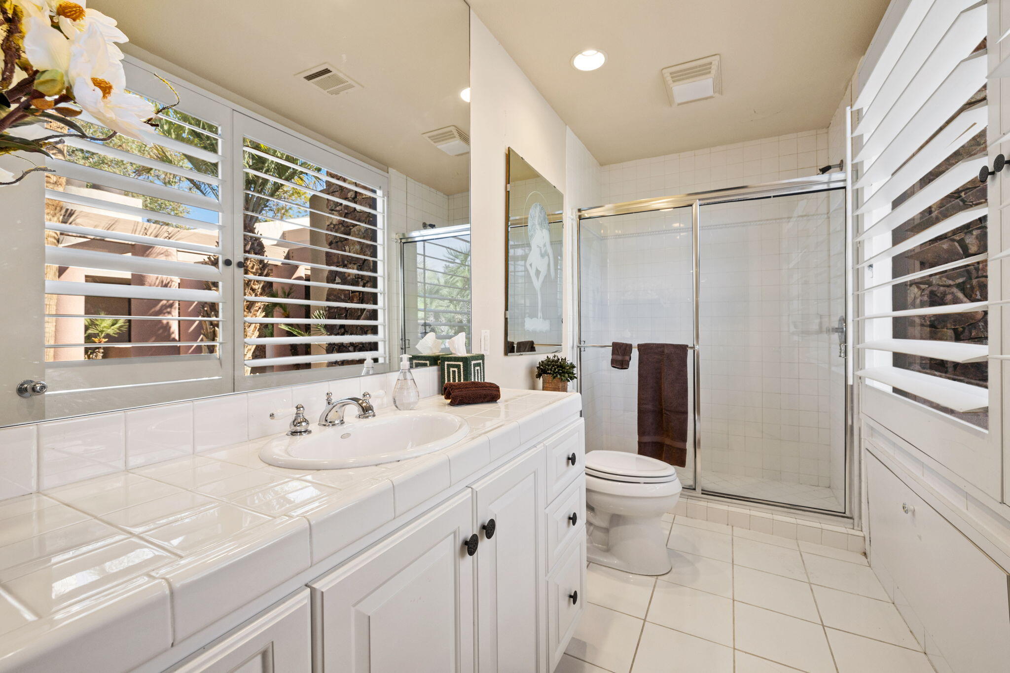7 Big Sioux Road Rancho Mirage, CA 92270 - Photo 32 of 64 a bathroom with a sink toilet and shower