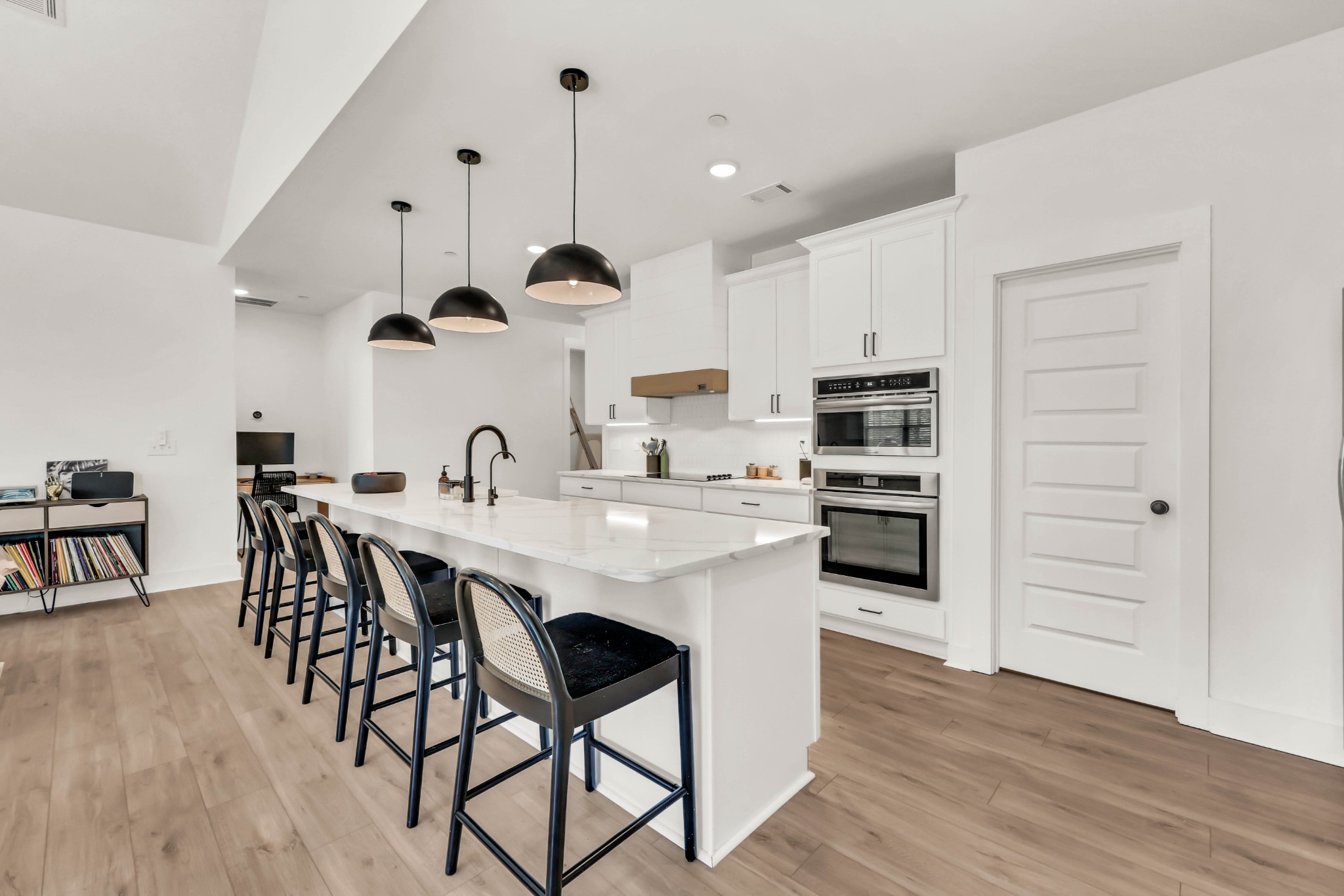 623 Centre Street Pleasant View, TN 37146 - Photo 13 of 53 a kitchen with stainless steel appliances kitchen island granite countertop a stove a sink and a refrigerator