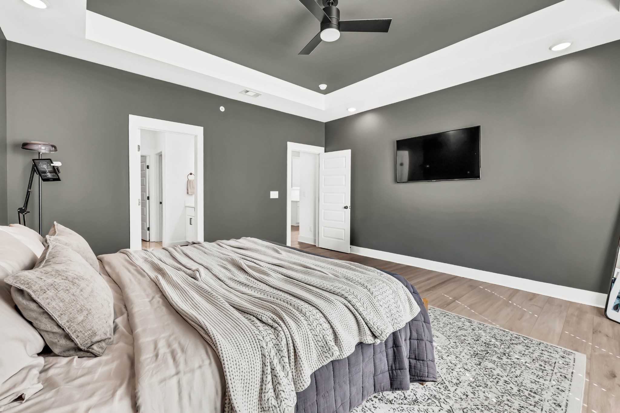 623 Centre Street Pleasant View, TN 37146 - Photo 25 of 53 a bedroom with a bed and a flat screen tv