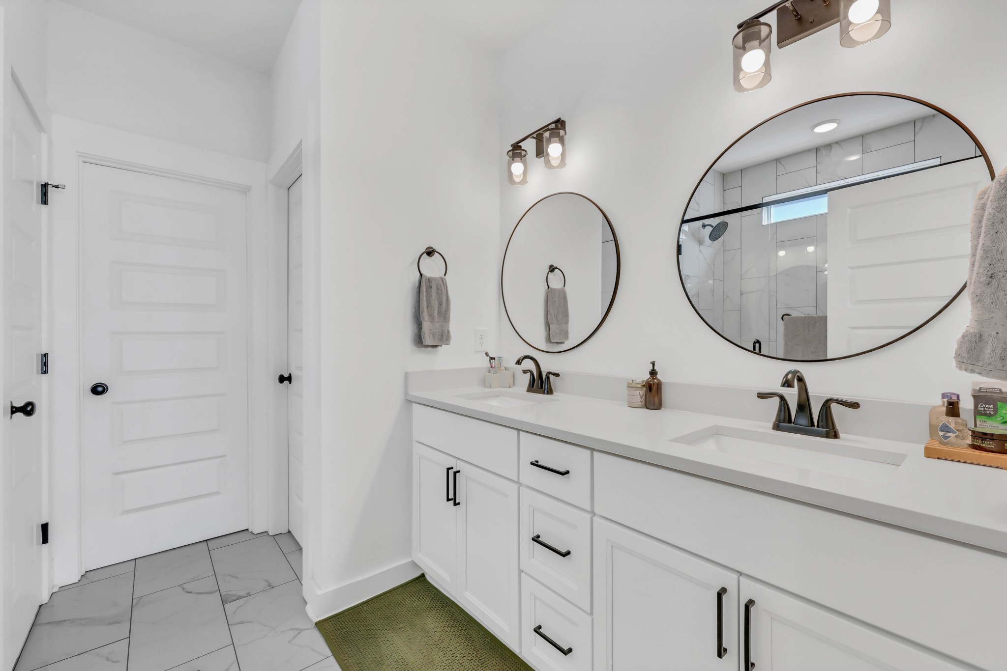 623 Centre Street Pleasant View, TN 37146 - Photo 26 of 53 a bathroom with a double vanity sink and a mirror