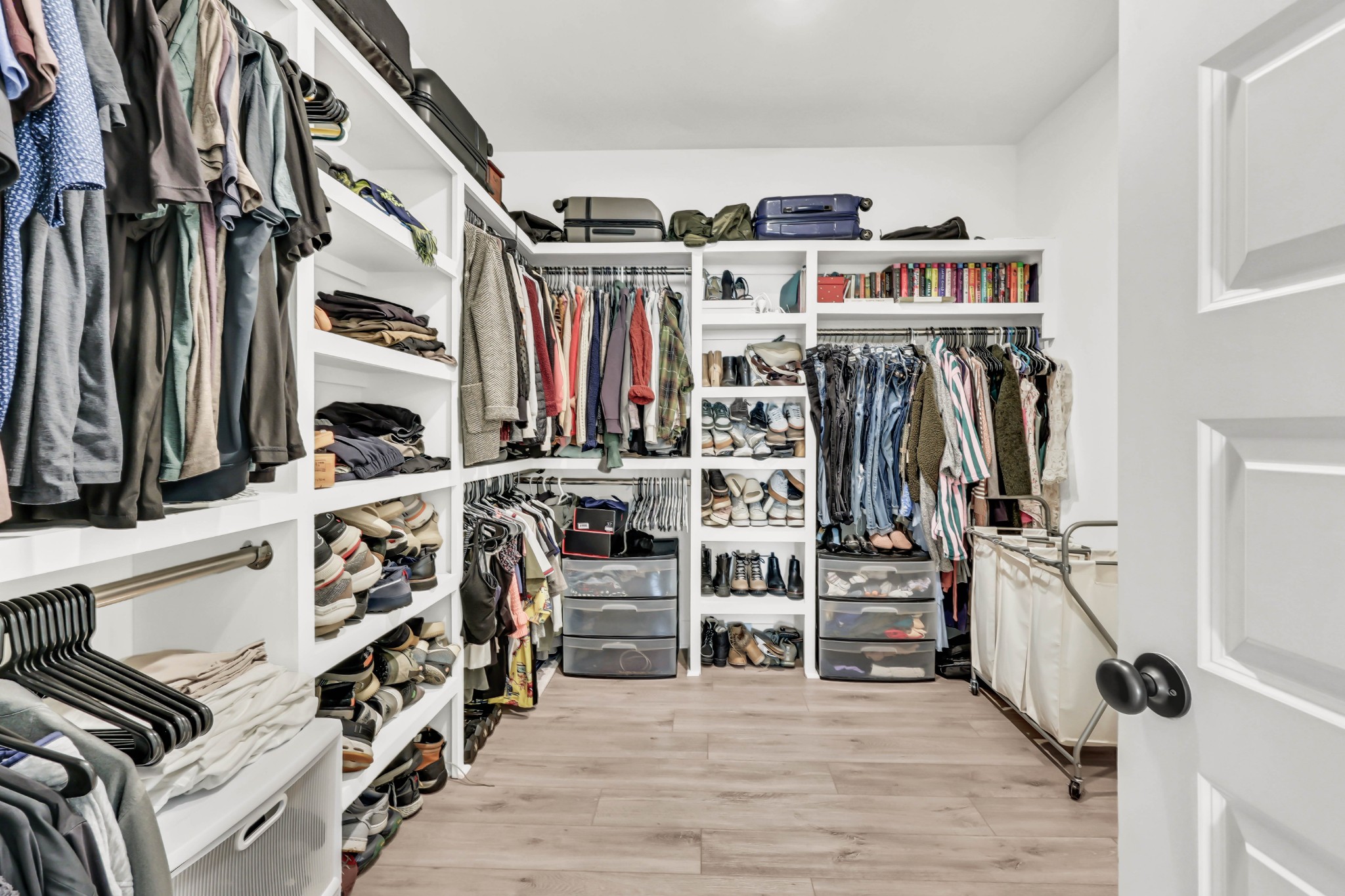 623 Centre Street Pleasant View, TN 37146 - Photo 28 of 53 a view of walk in closet with clothes and shoes