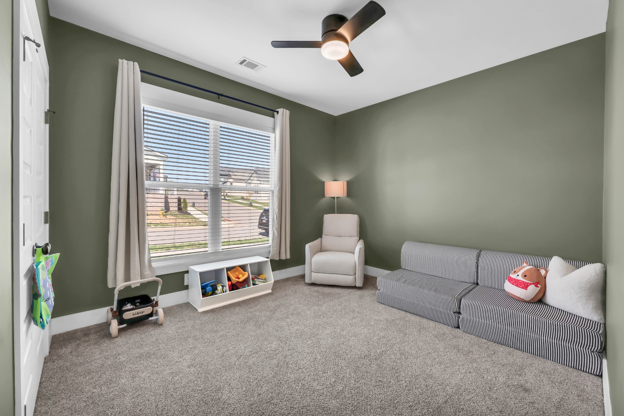 623 Centre Street Pleasant View, TN 37146 - Photo 30 of 53 a living room with furniture and a window
