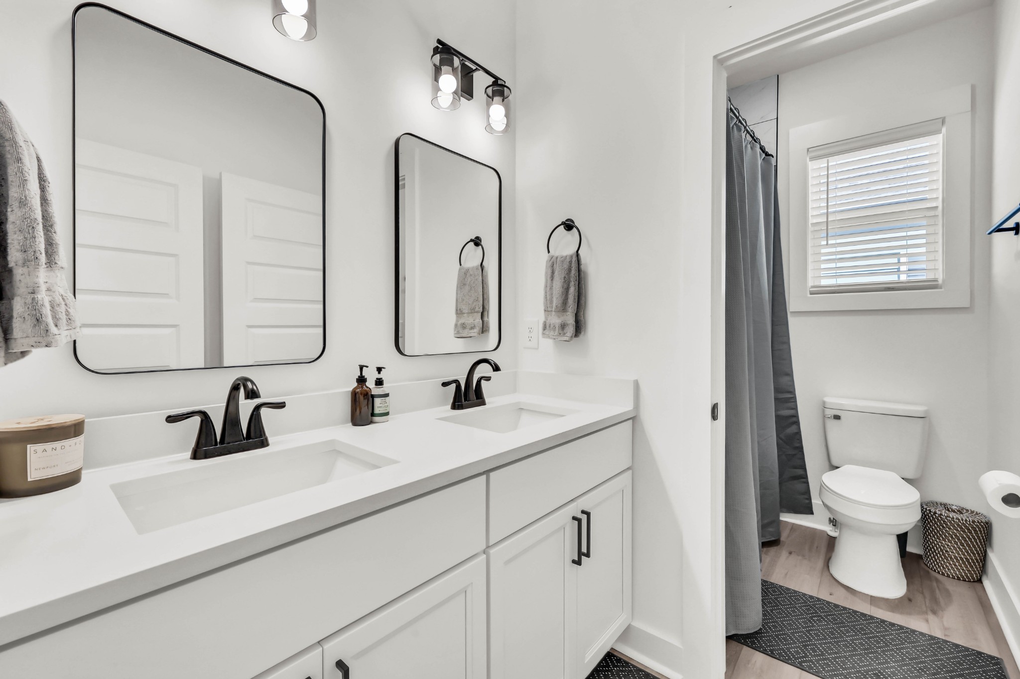 623 Centre Street Pleasant View, TN 37146 - Photo 32 of 53 a bathroom with a double vanity sink mirror and toilet