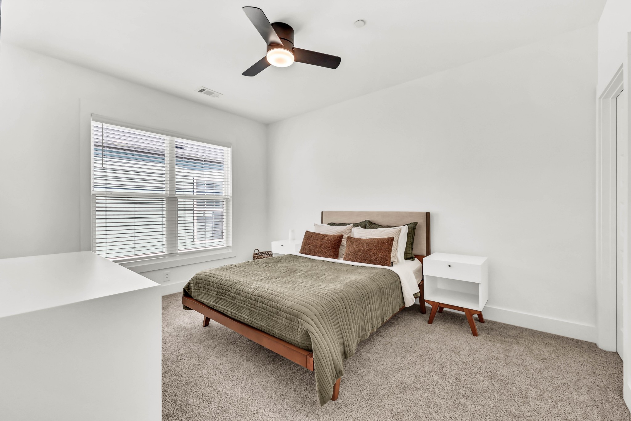 623 Centre Street Pleasant View, TN 37146 - Photo 33 of 53 a spacious bedroom with a bed and a window