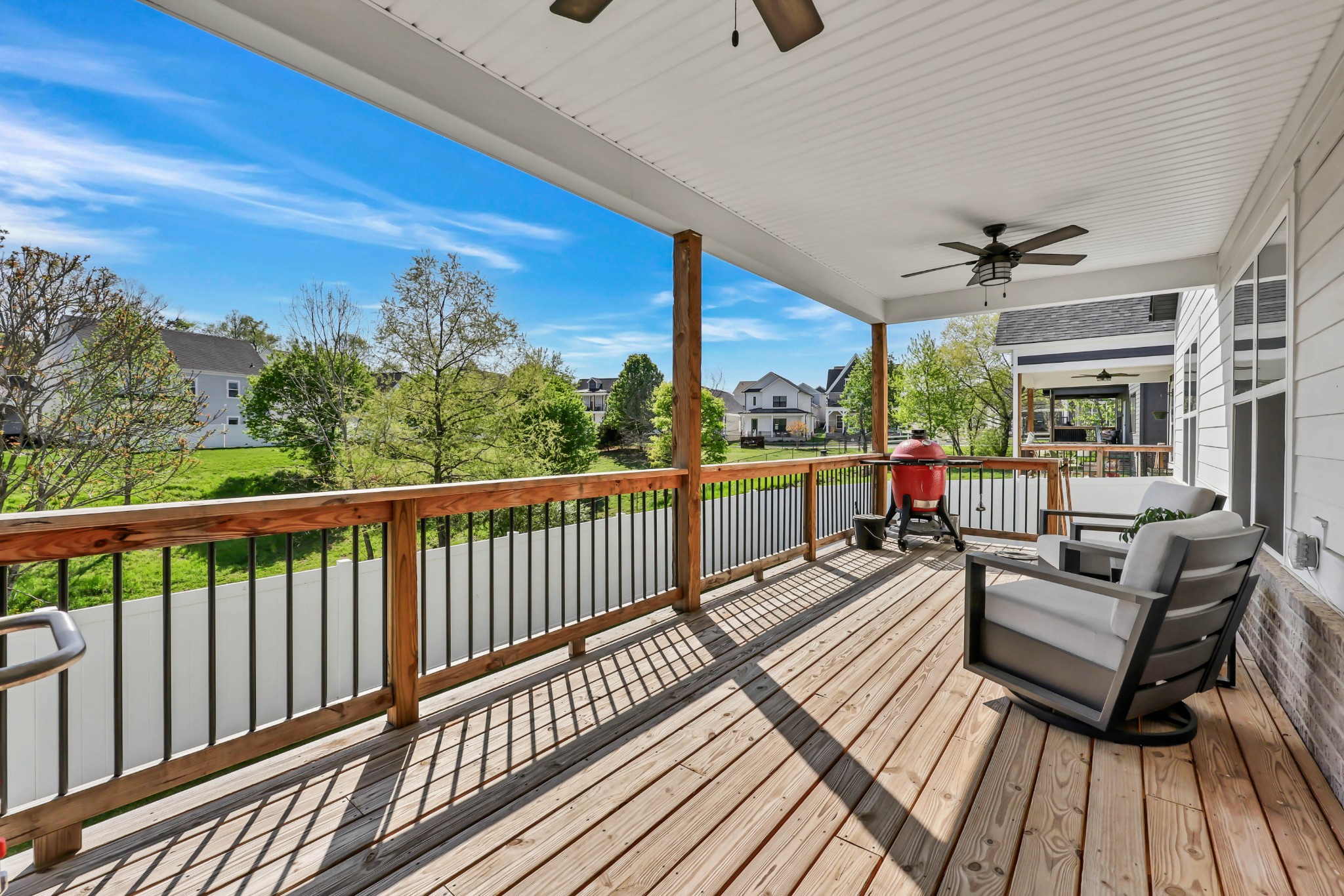 623 Centre Street Pleasant View, TN 37146 - Photo 35 of 53 a balcony with wooden floor and outdoor seating