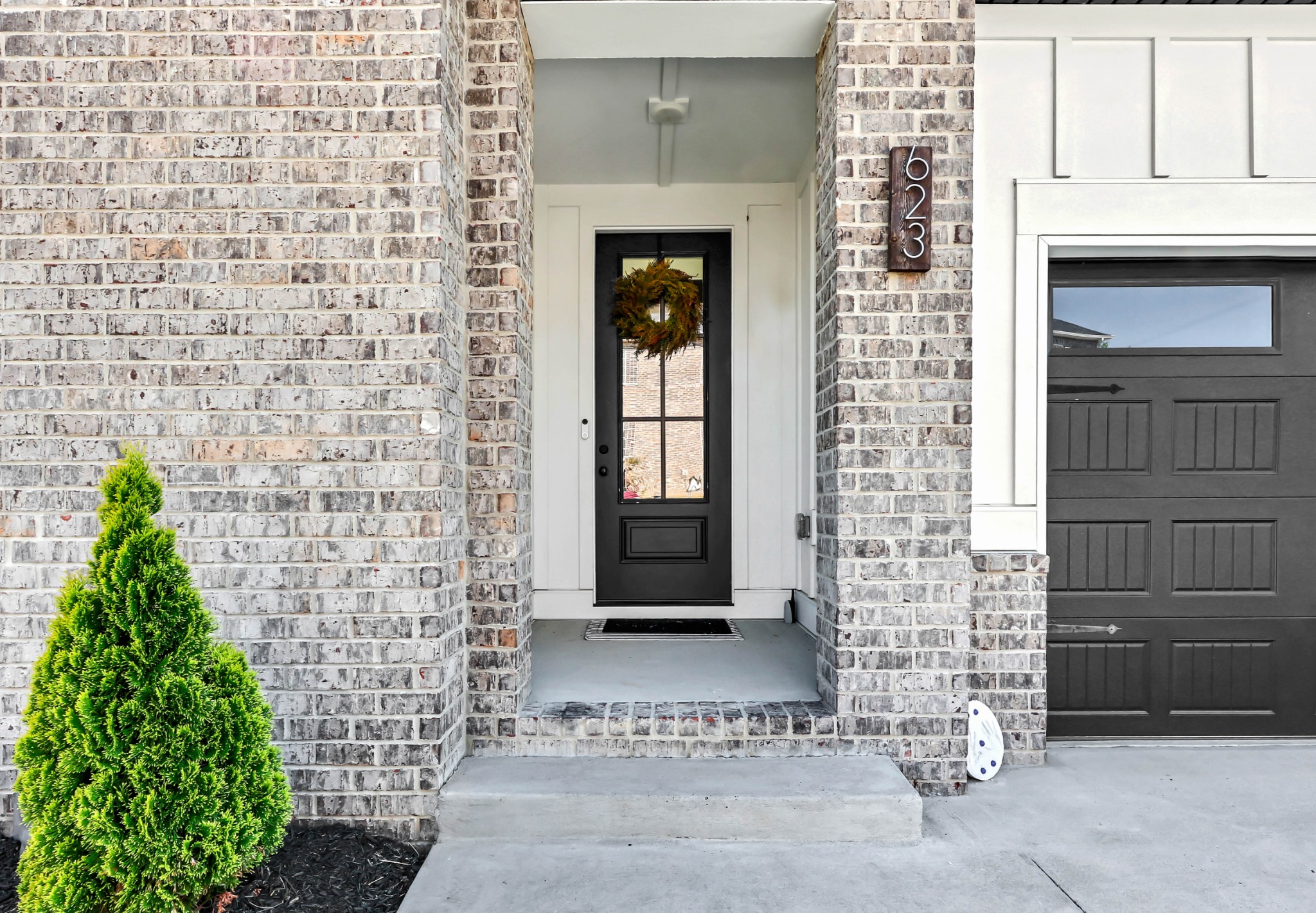 623 Centre Street Pleasant View, TN 37146 - Photo 4 of 53 a front view of a house with a garden