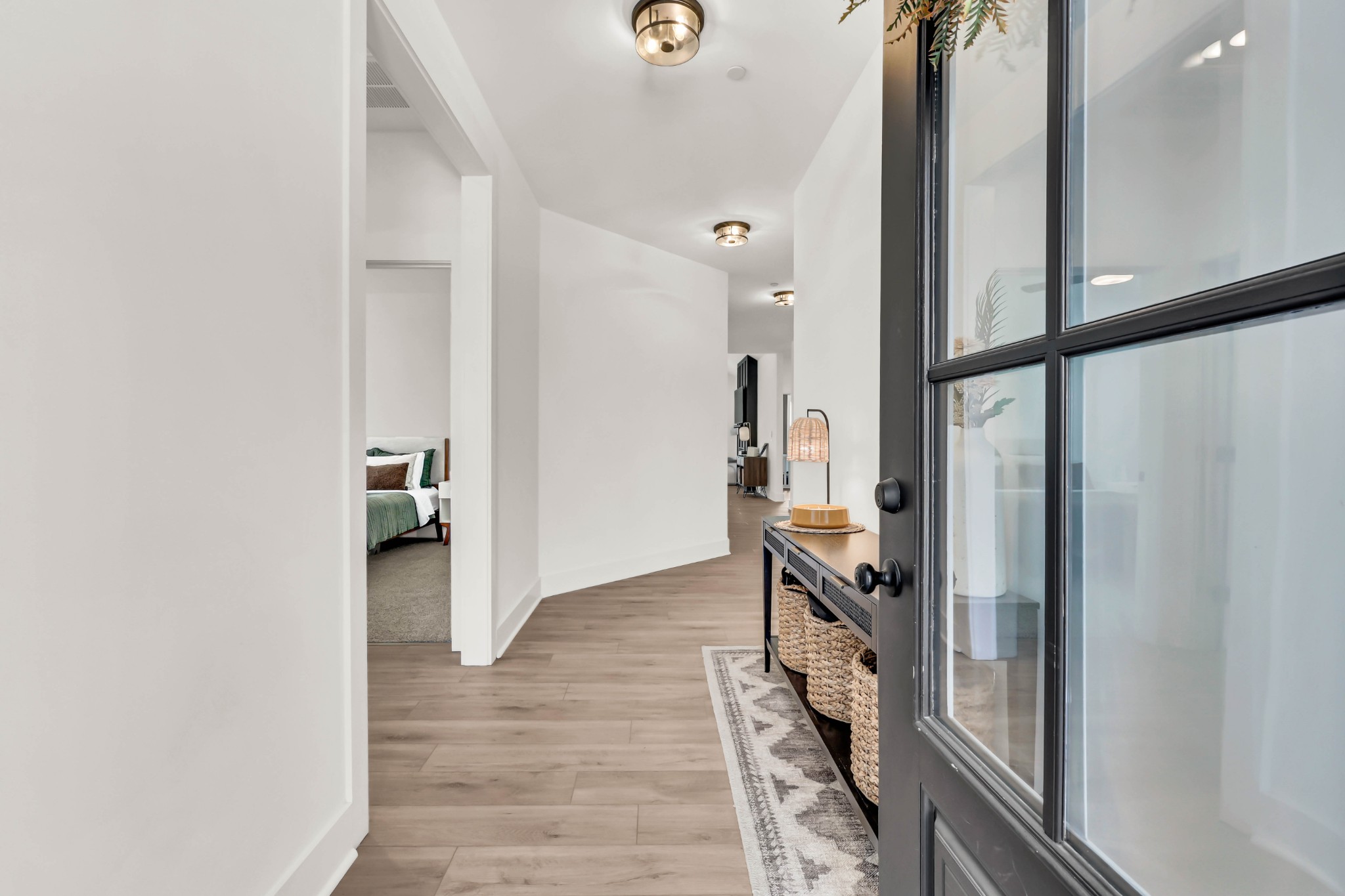 623 Centre Street Pleasant View, TN 37146 - Photo 5 of 53 a view of a hallway with wooden floor and staircase