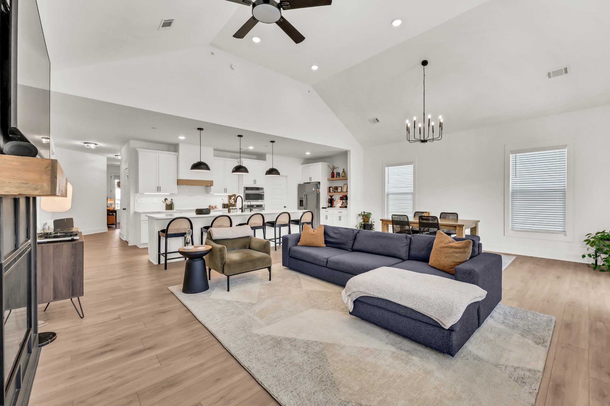 623 Centre Street Pleasant View, TN 37146 - Photo 6 of 53 a living room with furniture kitchen view and a chandelier