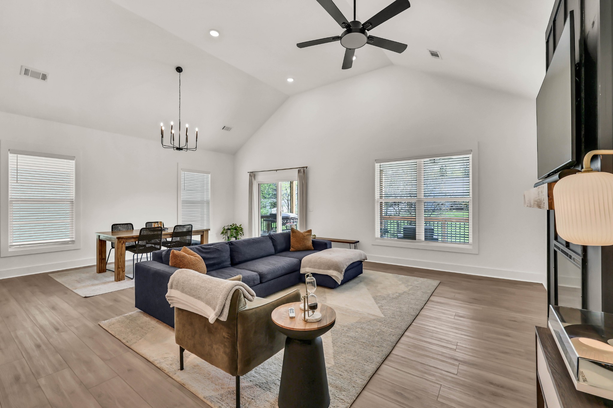 623 Centre Street Pleasant View, TN 37146 - Photo 7 of 53 a living room with furniture a fireplace and a flat screen tv