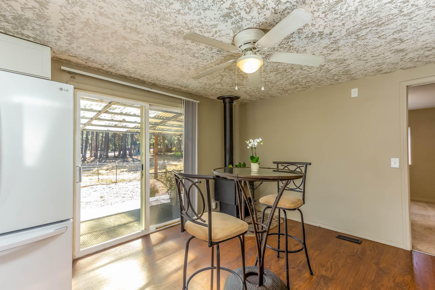 19151 Kiowa Road Bend, OR 97702 - Photo 5 of 32 Breakfast Nook with Certified Woodstove