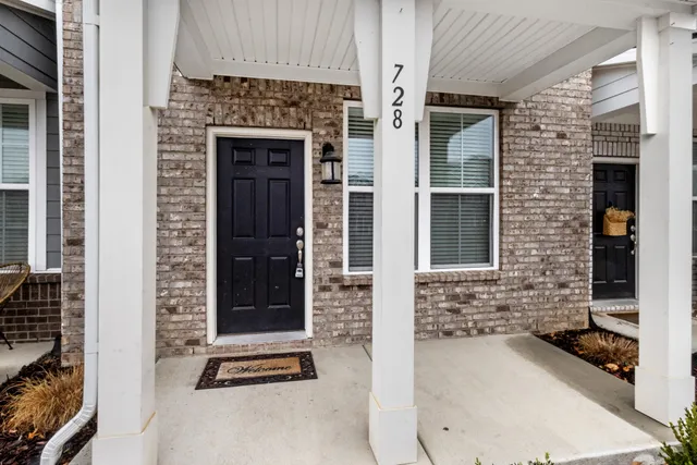 a front view of a house with a door