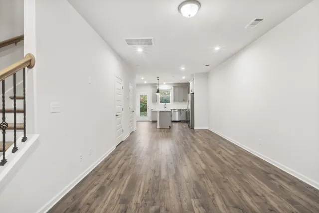 a view of kitchen with wooden floor