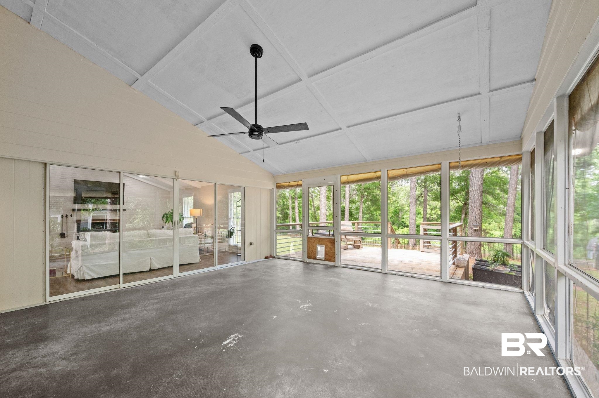 110 Ferncliff Circle Daphne, AL 36526 - Photo 31 of 40 Unfurnished sunroom with vaulted ceiling and a ceiling fan