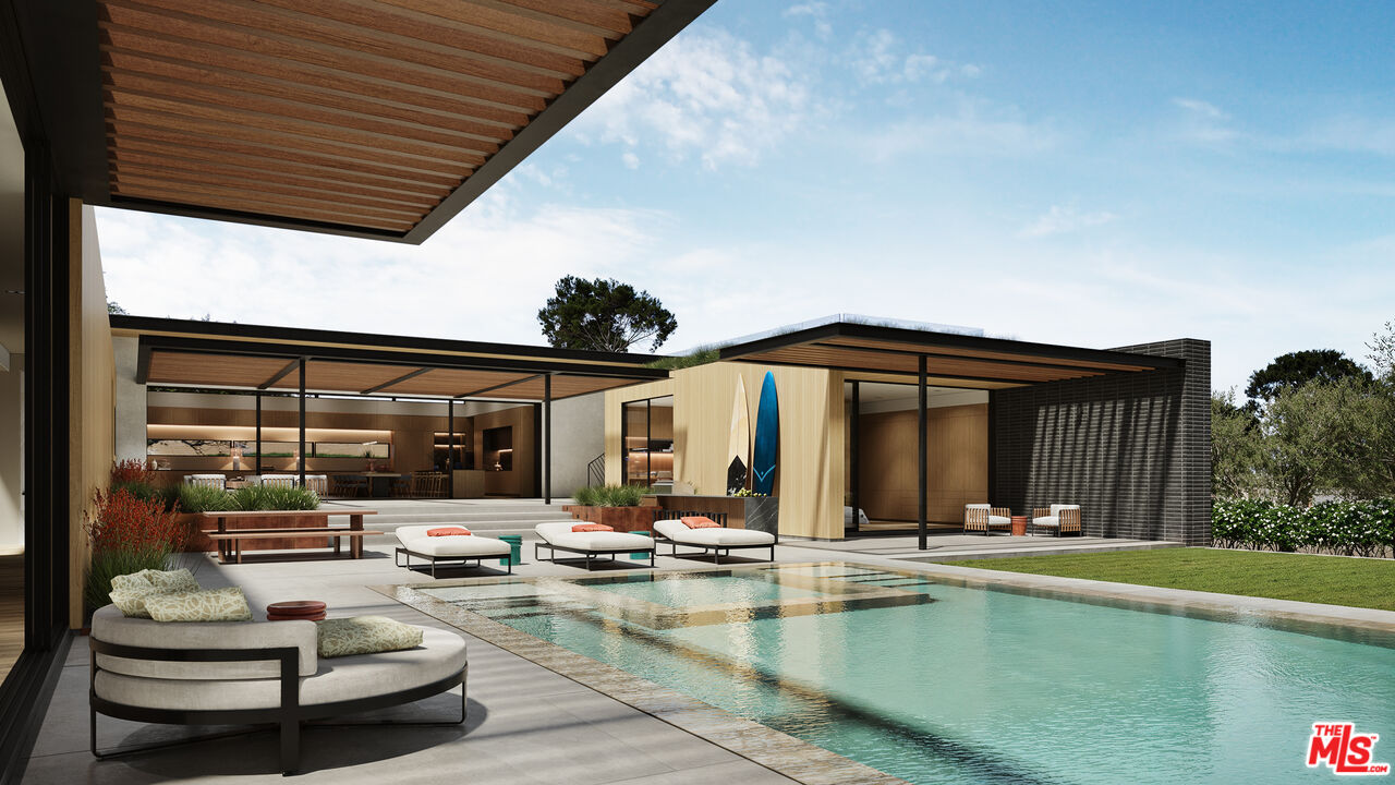 29636 Cuthbert Road Malibu, CA 90265 - Photo 14 of 30 a view of a patio with table and chairs couches with wooden floor and a yard