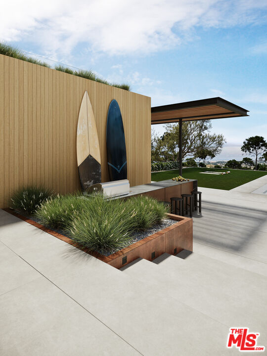 29636 Cuthbert Road Malibu, CA 90265 - Photo 17 of 30 a view of swimming pool with a yard