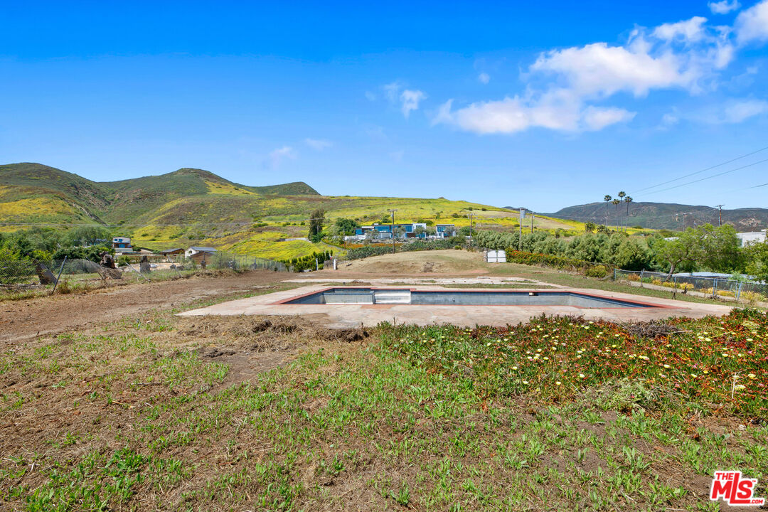 29636 Cuthbert Road Malibu, CA 90265 - Photo 27 of 30 a view of a lake with a mountain