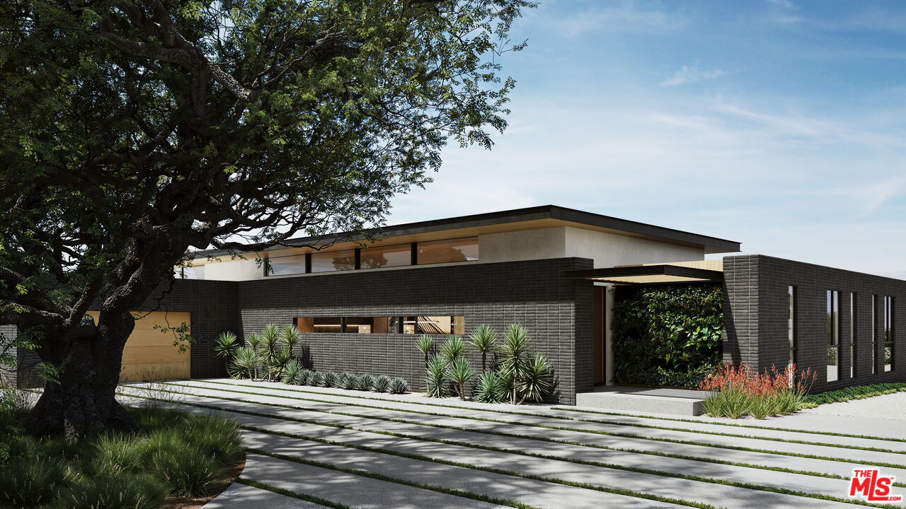 29636 Cuthbert Road Malibu, CA 90265 - Photo 4 of 30 a front view of a house with a porch