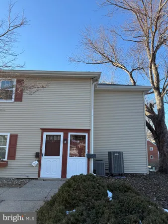 a view of a house with a garden