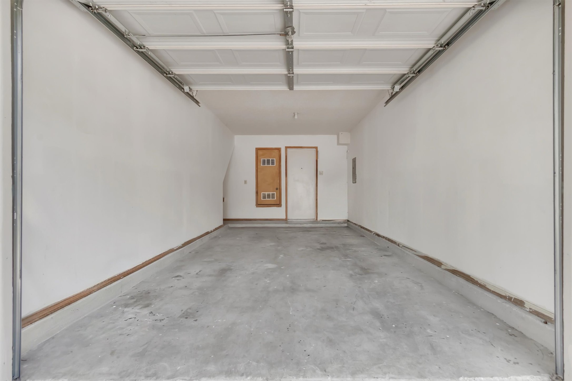 7802 Topawa Cove, Unit B Austin, TX 78729 - Photo 23 of 32 A spacious, one-car garage offers ample storage and direct home access.