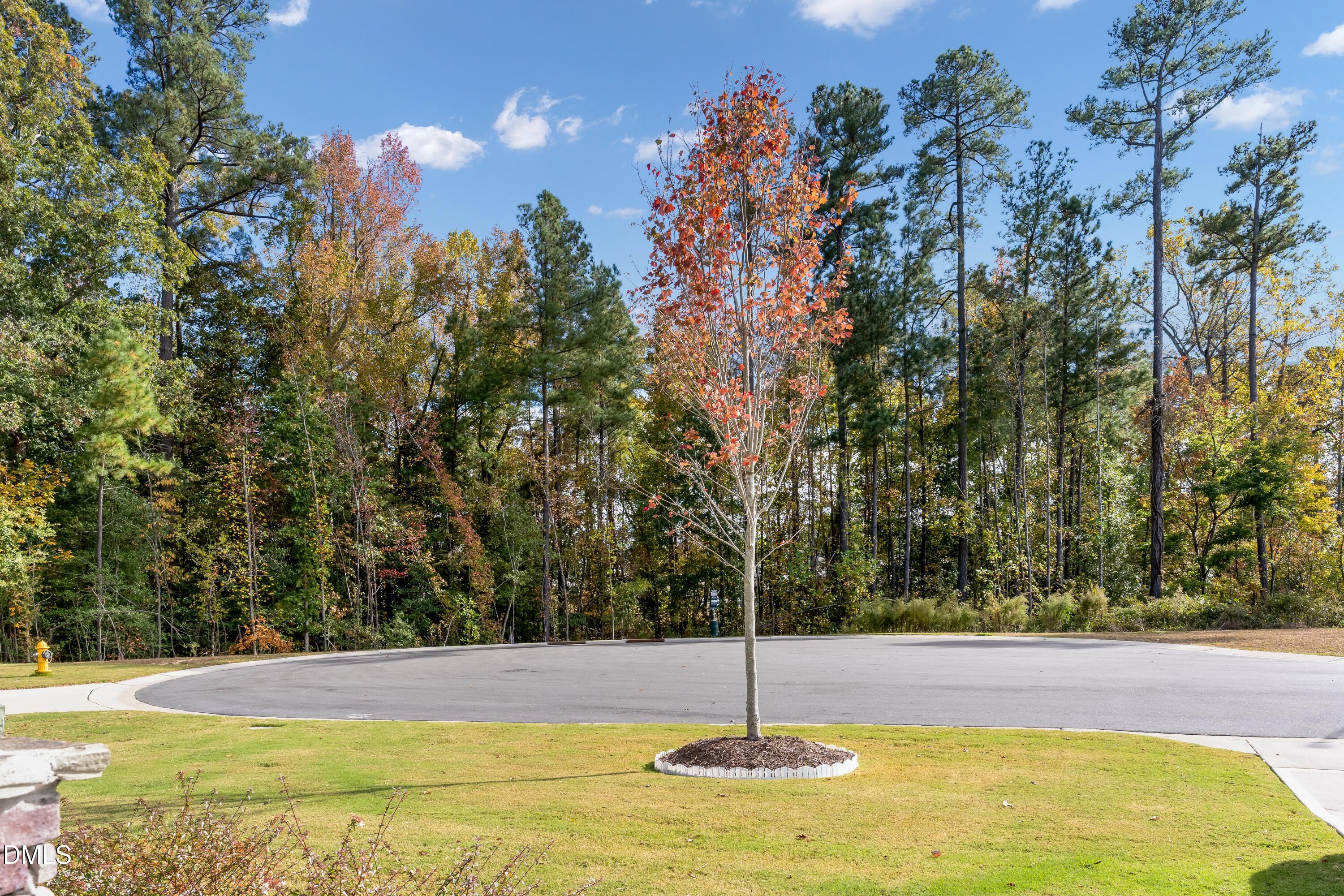 8017 Toddwick Court Raleigh, NC 27616 - Photo 25 of 30 a view of a swimming pool with an outdoor space and seating area