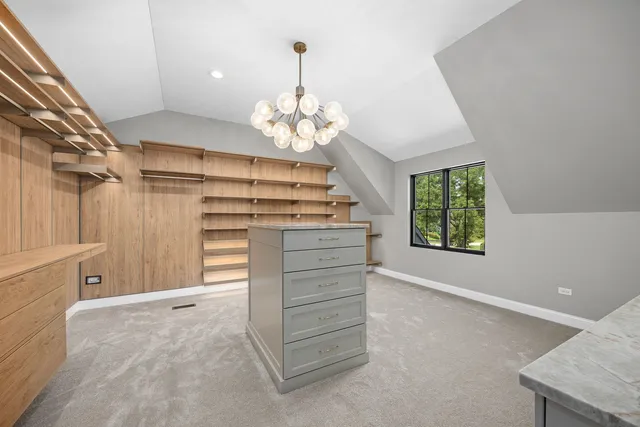 a view of a storage & utility room with a window