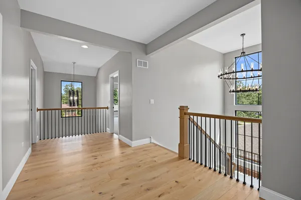 a view of entryway with wooden floor