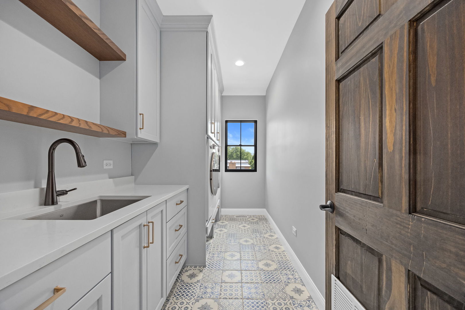 1-s710 Shaffner Road Wheaton, IL 60189 - Photo 16 of 19 a kitchen with a sink and a wooden floor
