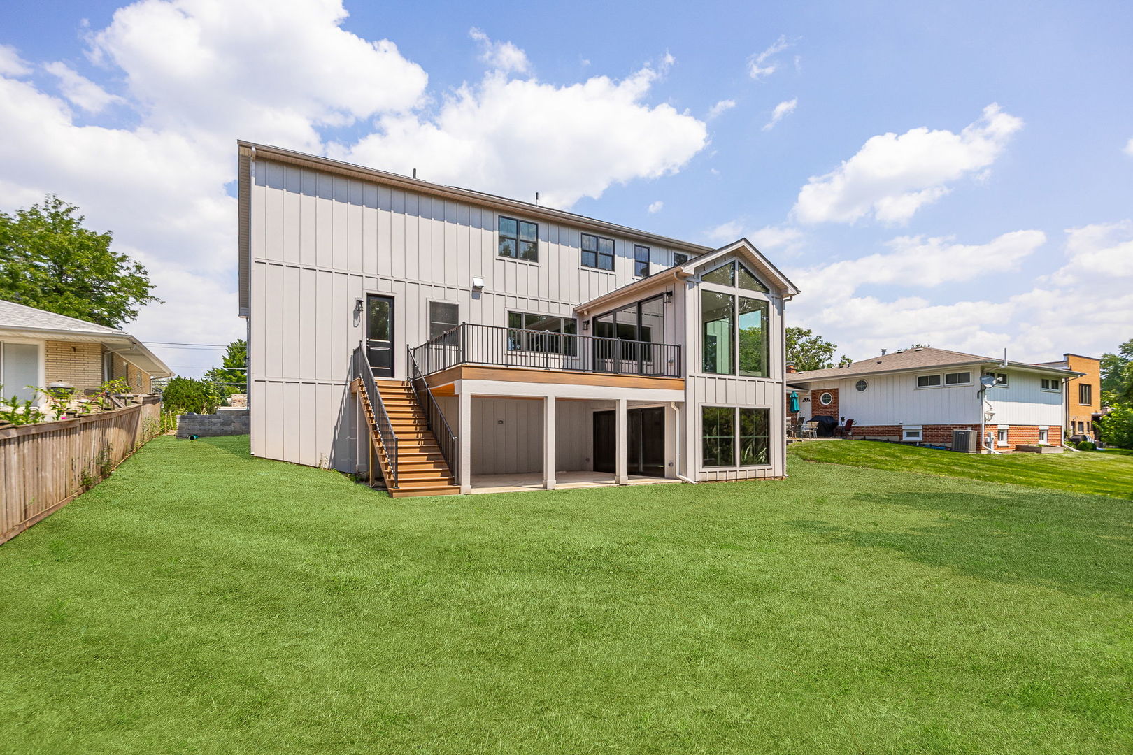 1-s710 Shaffner Road Wheaton, IL 60189 - Photo 19 of 19 a view of a house with a yard and many windows