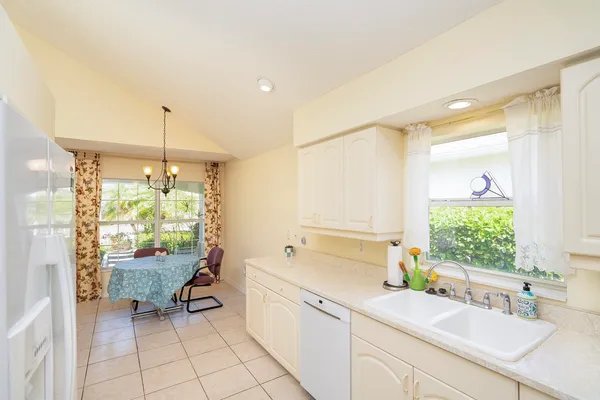 an aerial view of a house with a garden