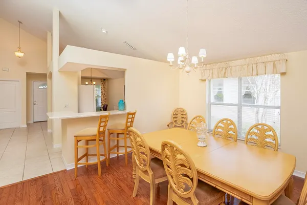 an aerial view of residential houses with city view