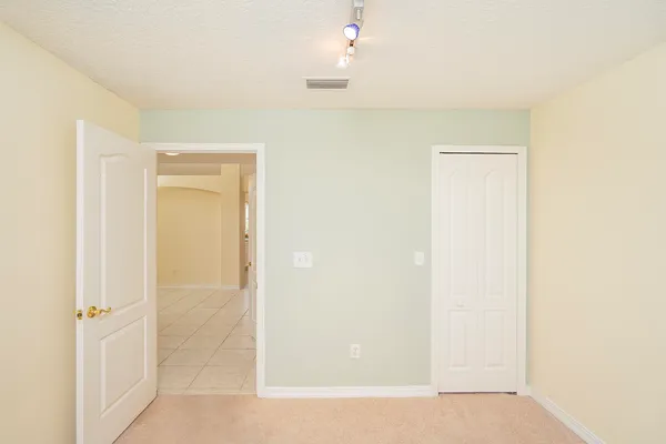 a bathroom with a shower and a sink
