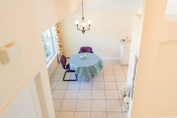 an aerial view of residential houses with outdoor space and river