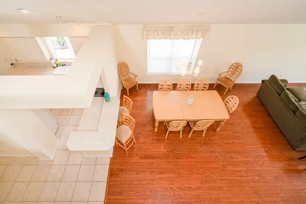 a table and chairs sitting in the middle of a lake