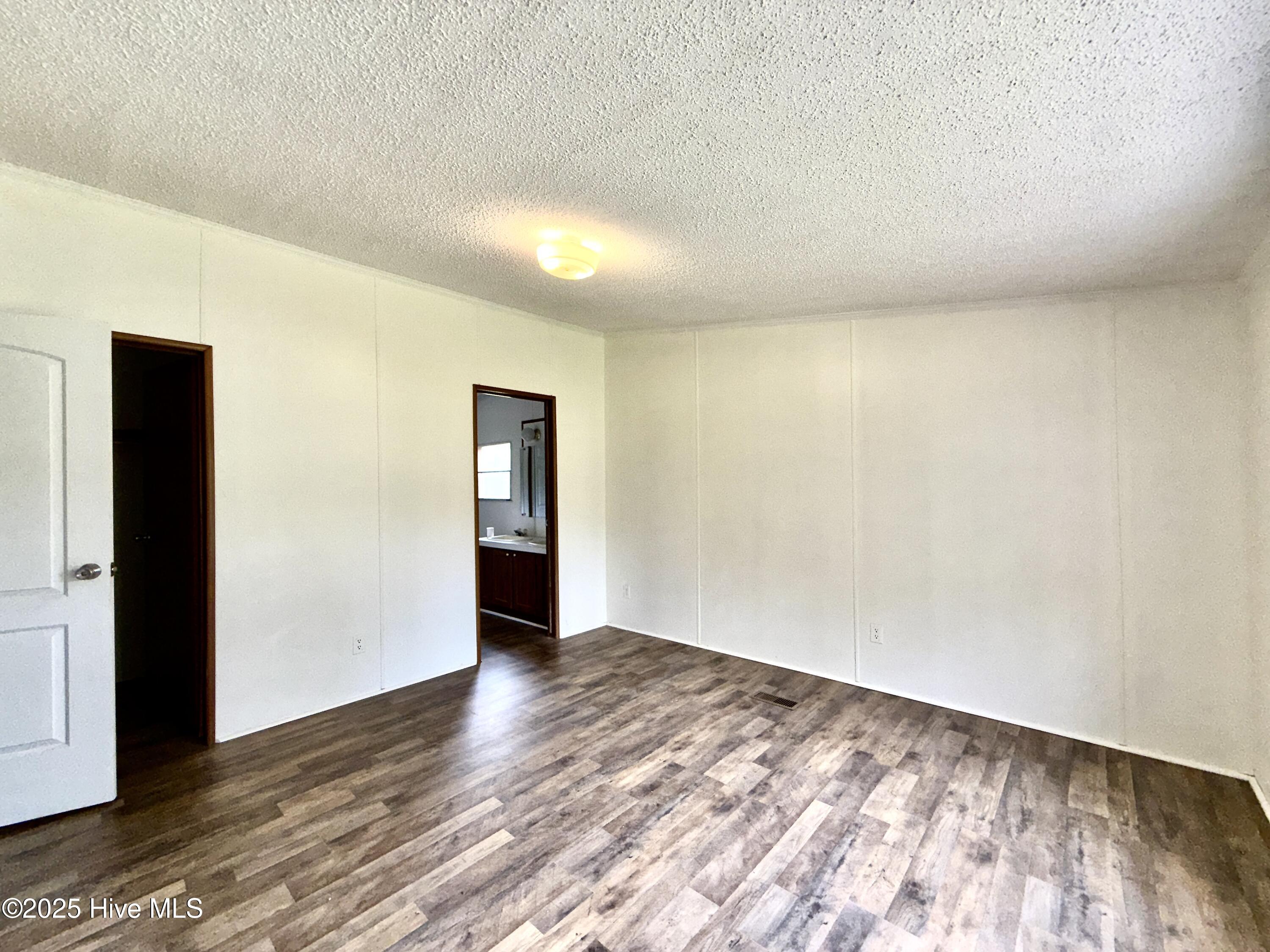 184 Hardison Road Holly Ridge, NC 28445 - Photo 10 of 22 Master Bedroom