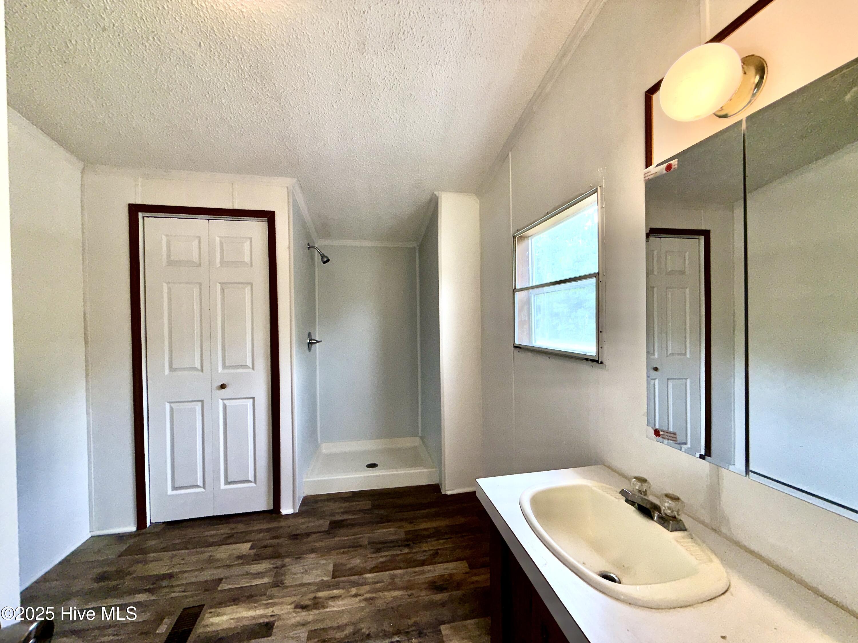 184 Hardison Road Holly Ridge, NC 28445 - Photo 12 of 22 Master bath with new walk in shower