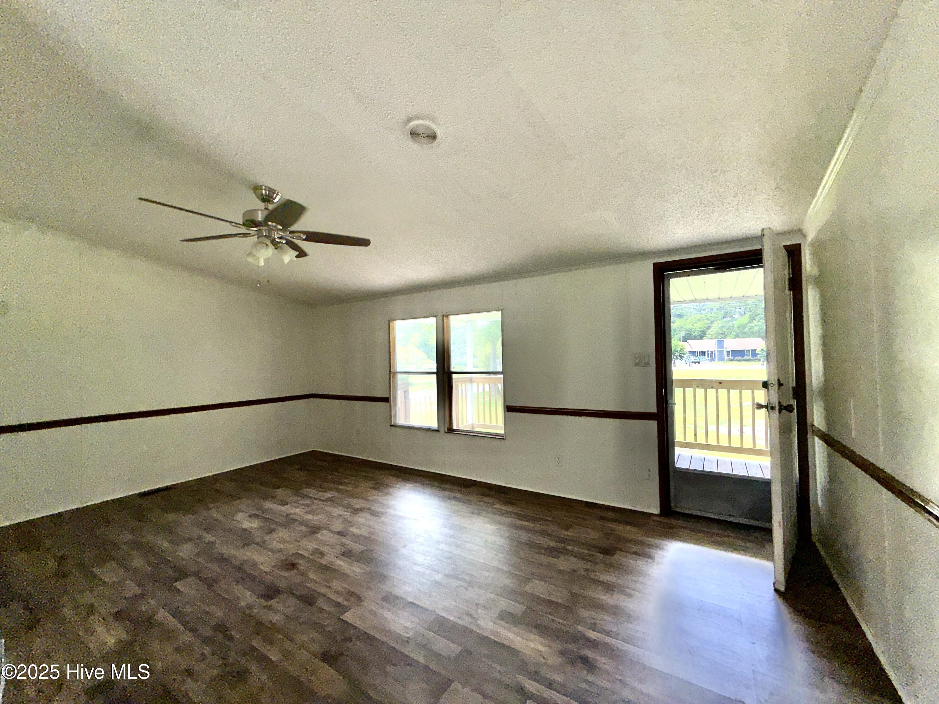 184 Hardison Road Holly Ridge, NC 28445 - Photo 5 of 22 Family Room/Den