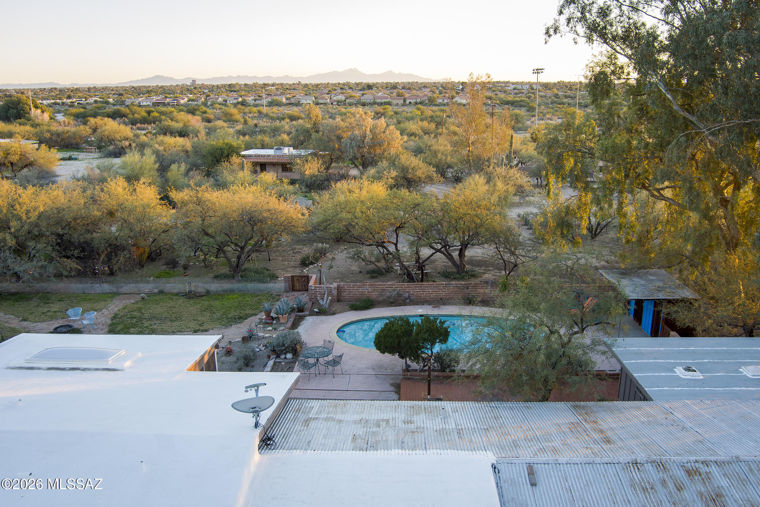 4130 East River Road Tucson, AZ 85718 - Photo 29 of 46 an aerial view of a house with garden space and lake view