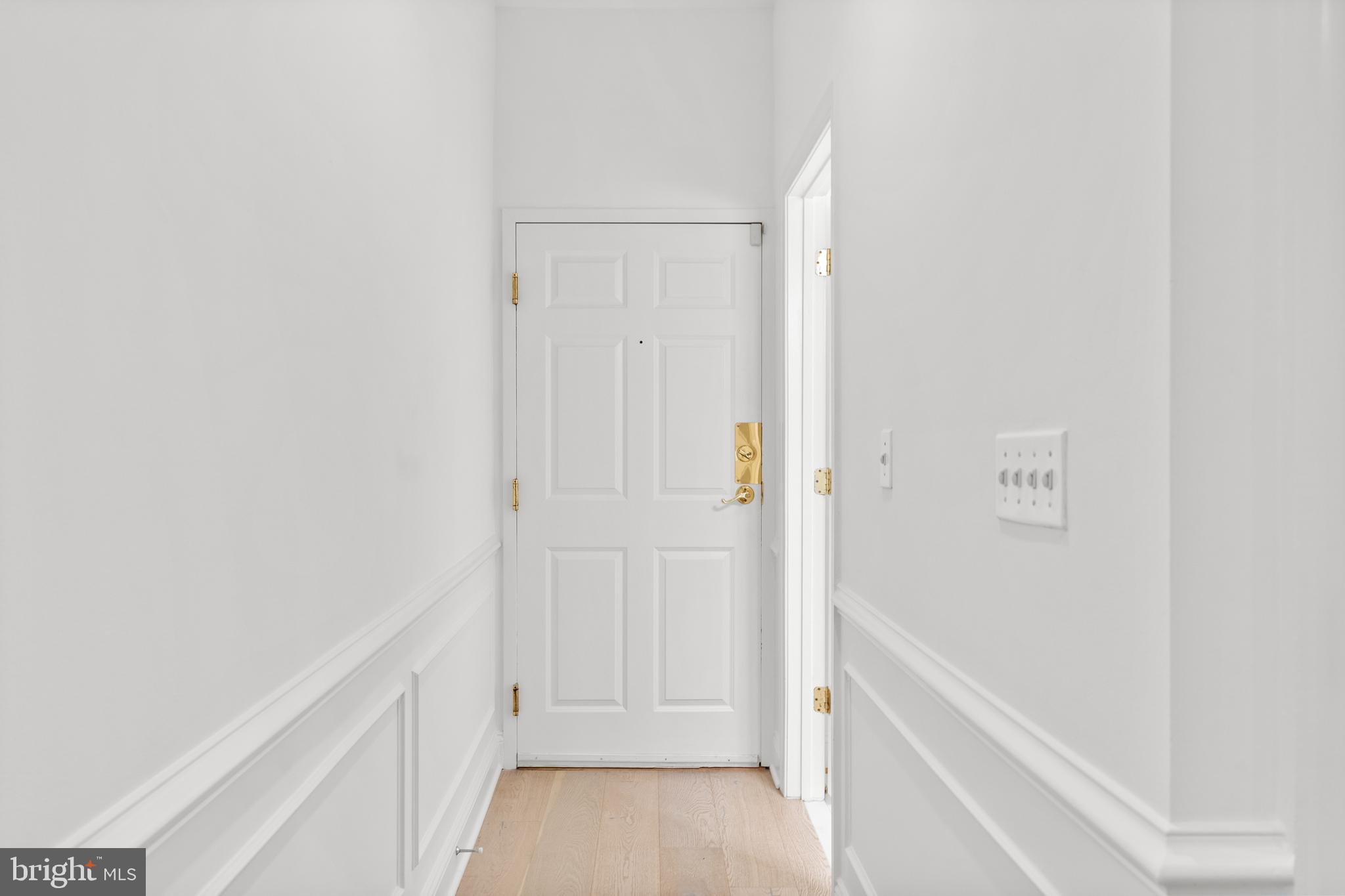 1229 12th Street Northwest, Unit B5 Washington, DC 20005 - Photo 4 of 32 Clean and Fresh Entryway & Stylish Paneling