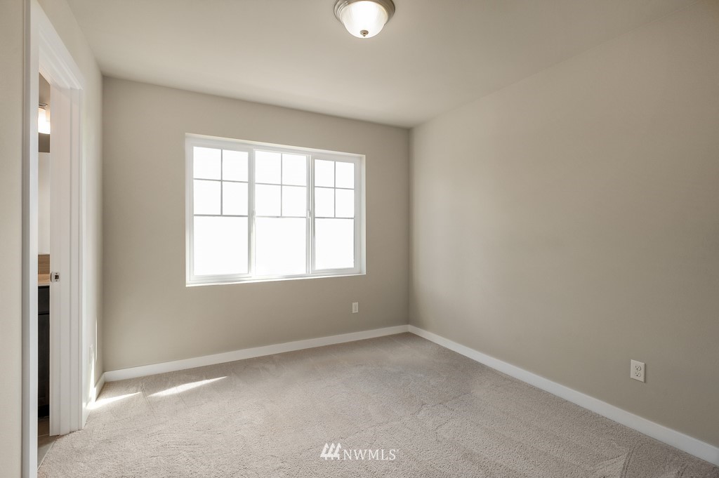 1621 Seattle Hill Road, Unit CC3 Bothell, WA 98012 - Photo 16 of 25 an empty room with a window