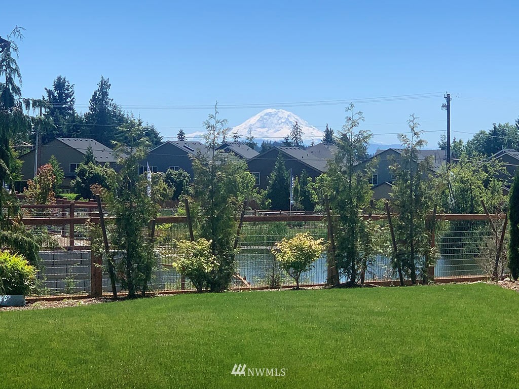 1621 Seattle Hill Road, Unit CC3 Bothell, WA 98012 - Photo 21 of 25 a view of a house with a big yard and a big yard