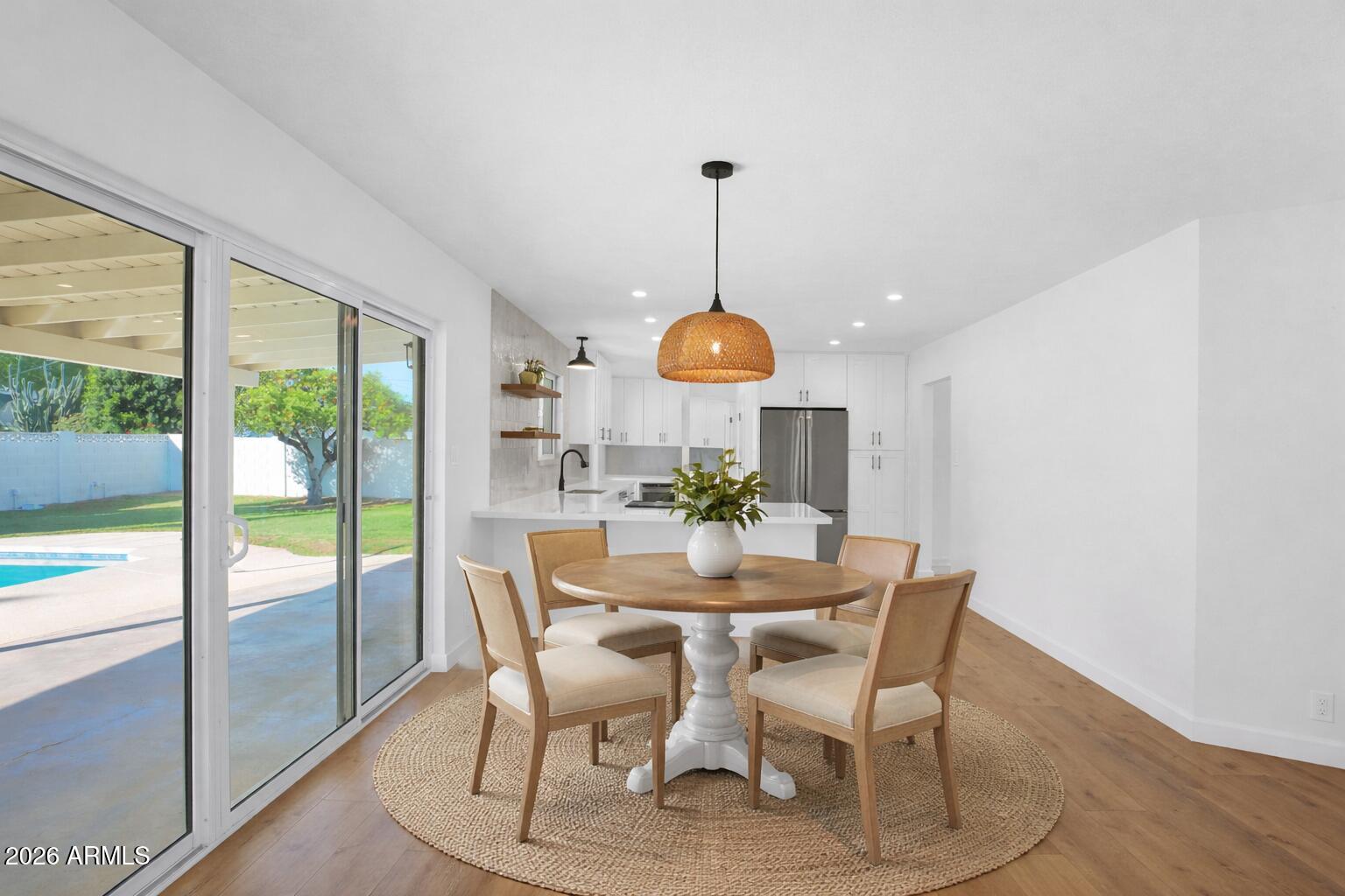 501 West Seldon Lane Phoenix, AZ 85021 - Photo 13 of 51 Modern farmhouse dining space with green