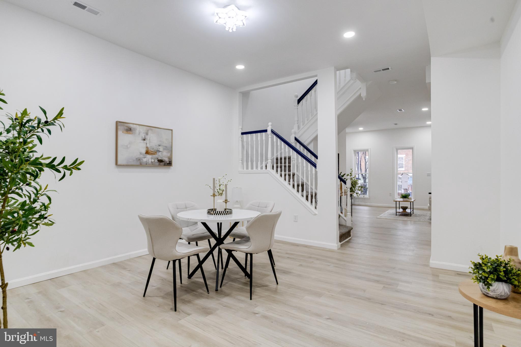 3015 Windsor Avenue Baltimore, MD 21216 - Photo 27 of 84 a dining room with furniture and wooden floor
