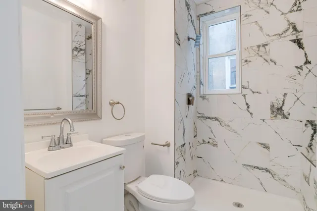 a view of a house with a snow in the yard