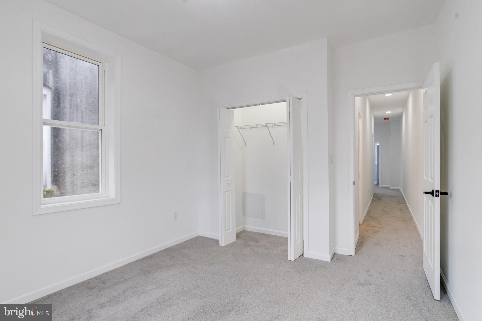 3015 Windsor Avenue Baltimore, MD 21216 - Photo 65 of 84 an empty room with windows