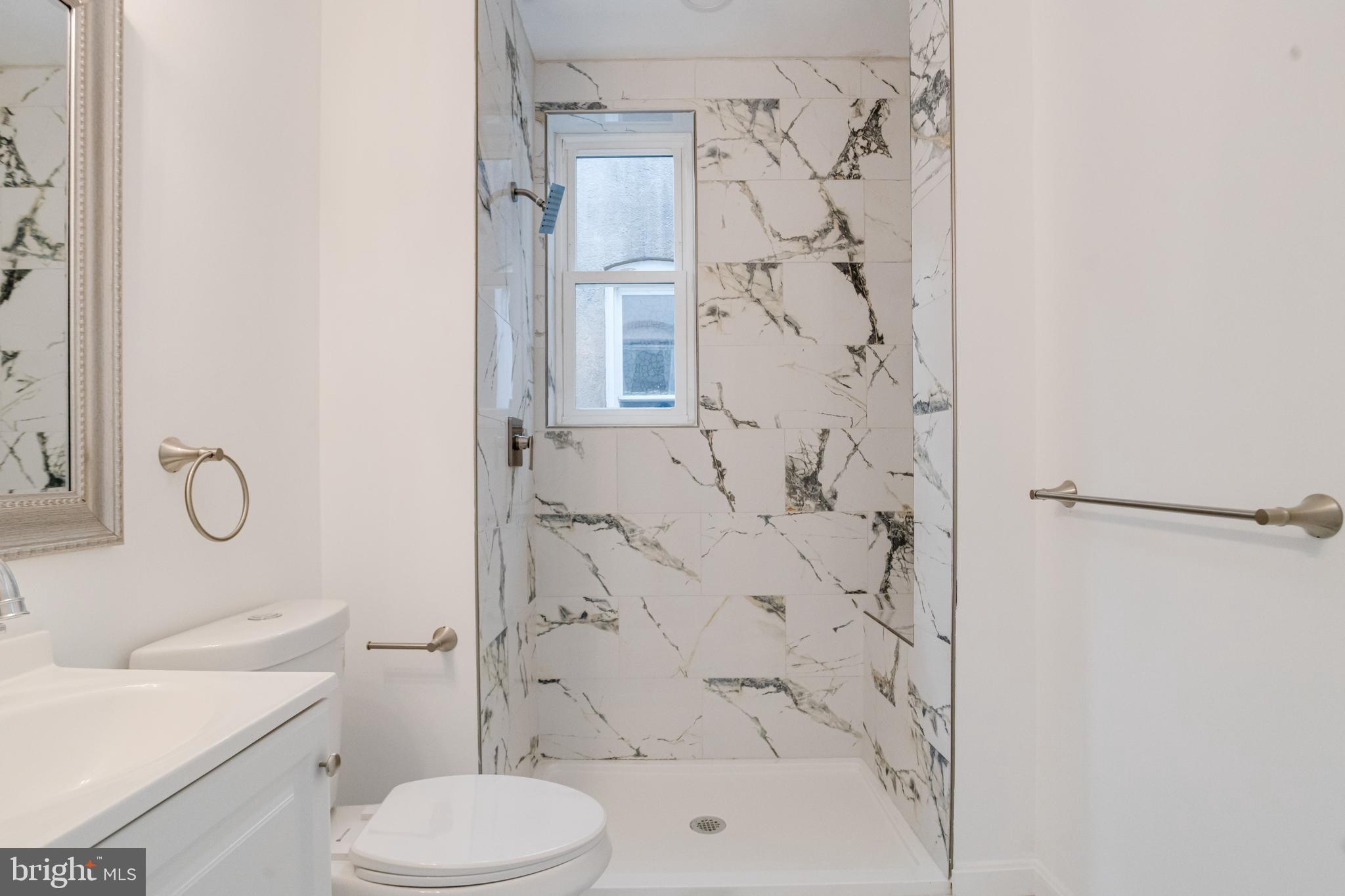 3015 Windsor Avenue Baltimore, MD 21216 - Photo 67 of 84 a bathroom with a toilet sink and shower